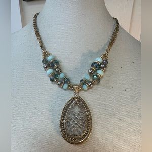 Large goldtone blue bead filigree statement necklace